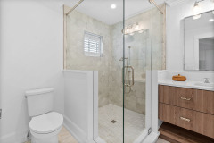 KeyRoyale-45_1-Shower-Glass-with-Header-holmes-beach-anna-maria-island