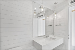 KeyRoyale-81_1-Pool-Bath-Double-Vanity-Custom-Mirror-holmes-beach-anna-maria-island